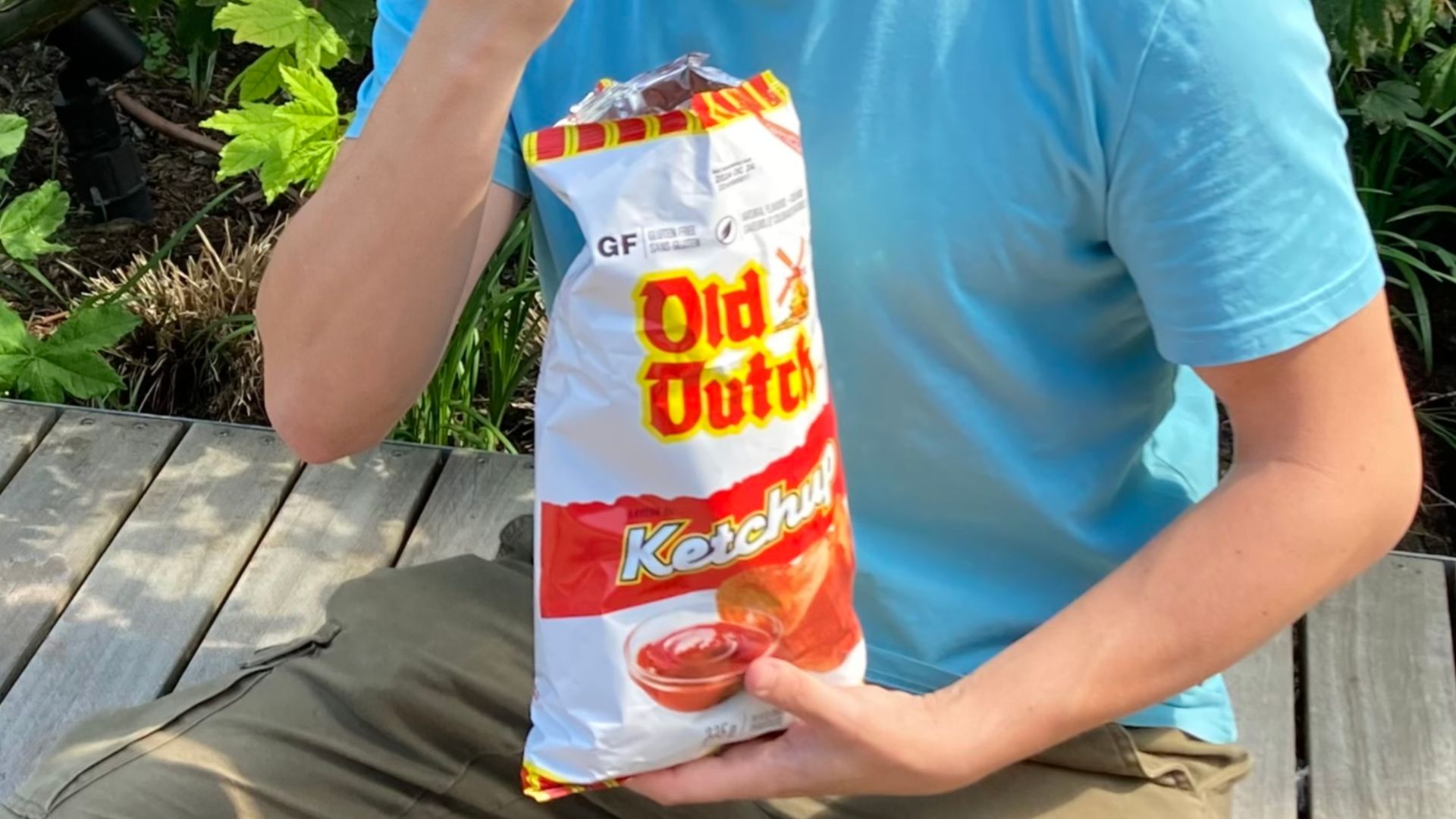 Man enjoying a ketchup chip