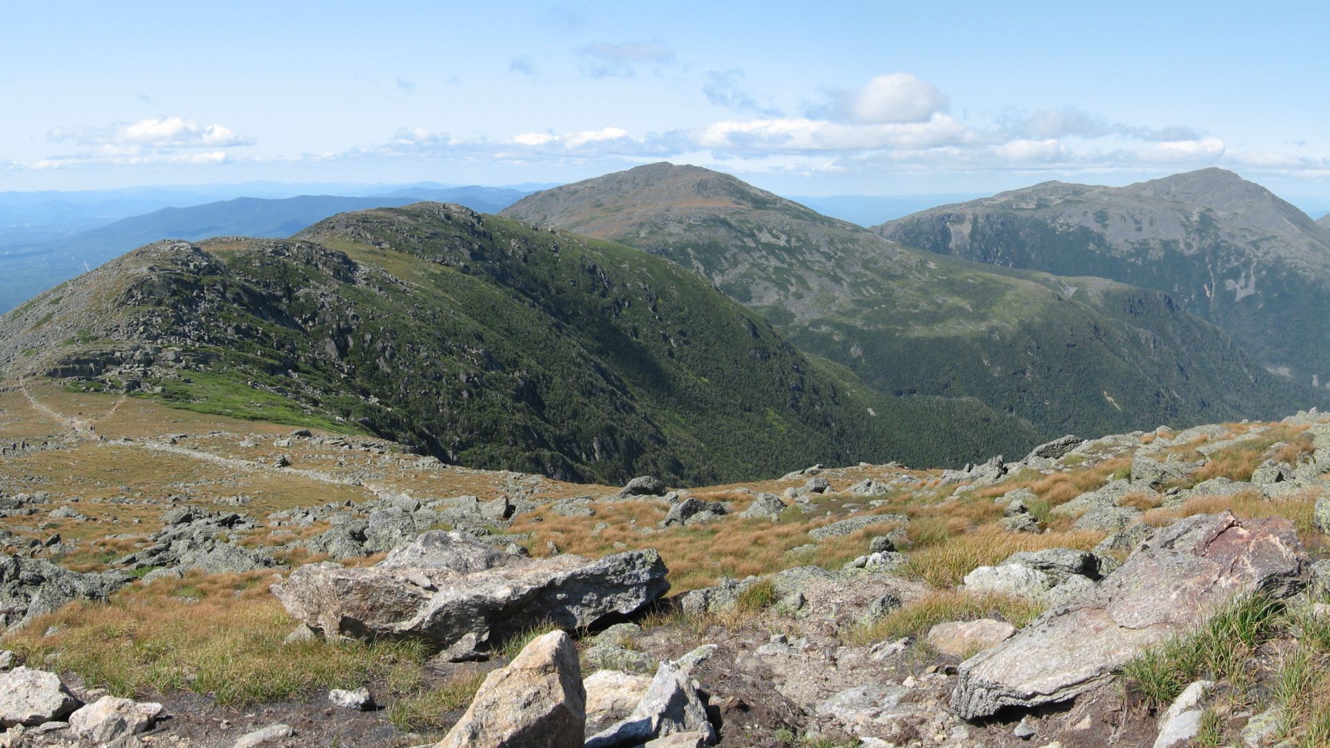 The northern section of the Presidential Range in New Hampshire's White Mountains. Viewed from the northwest side of Mount Washington. From left to right are Mount Clay, Mount Jefferson, Mount Adams, and Mount Madison.