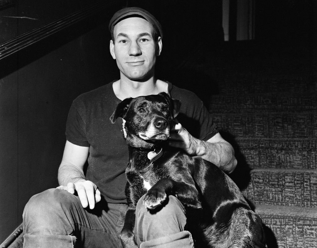 Patrick Stewart and a dog rescued in Leamington Spa by the Avon Dog Rescue Service