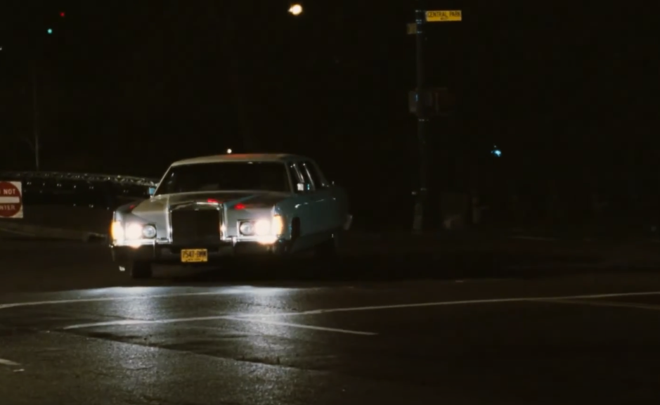 Actor playing Lennon arriving with white car