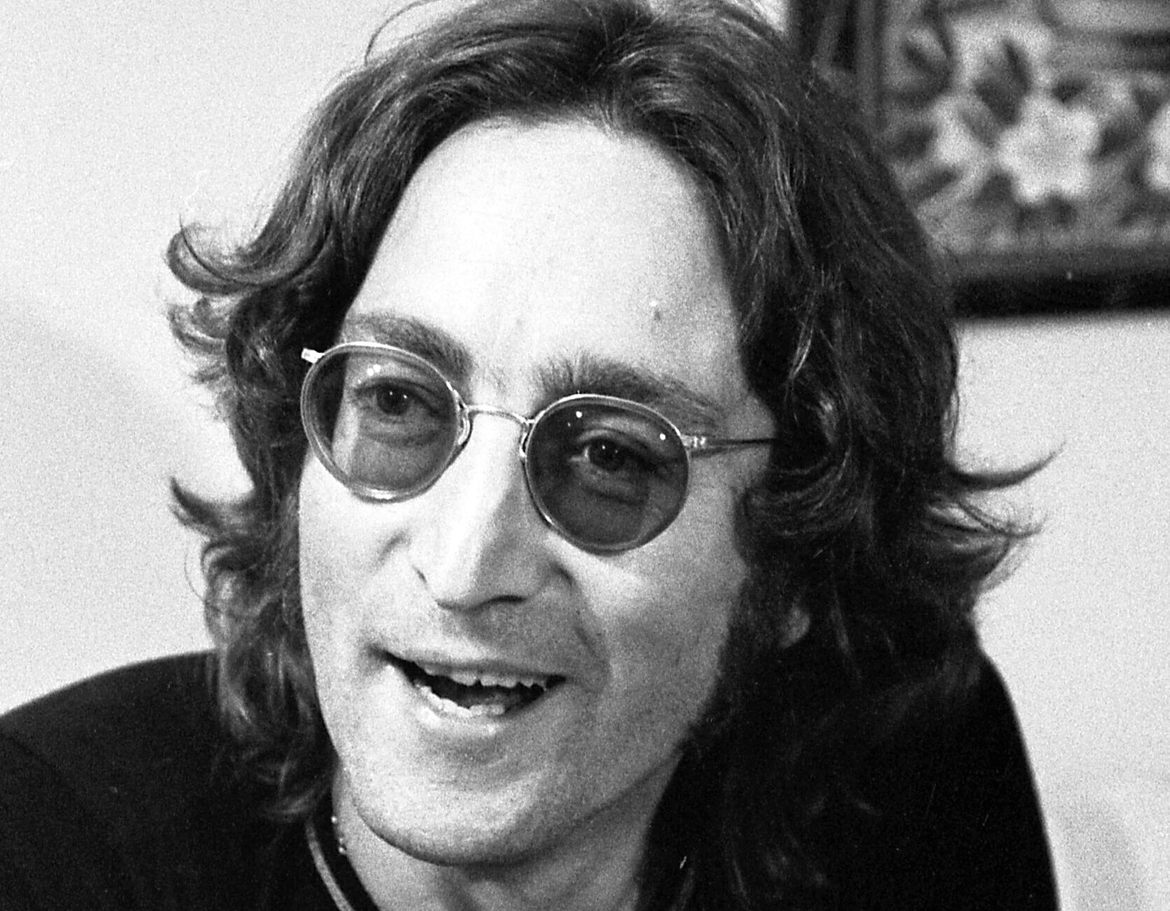 John Lennon, 1974  in black t-shirt