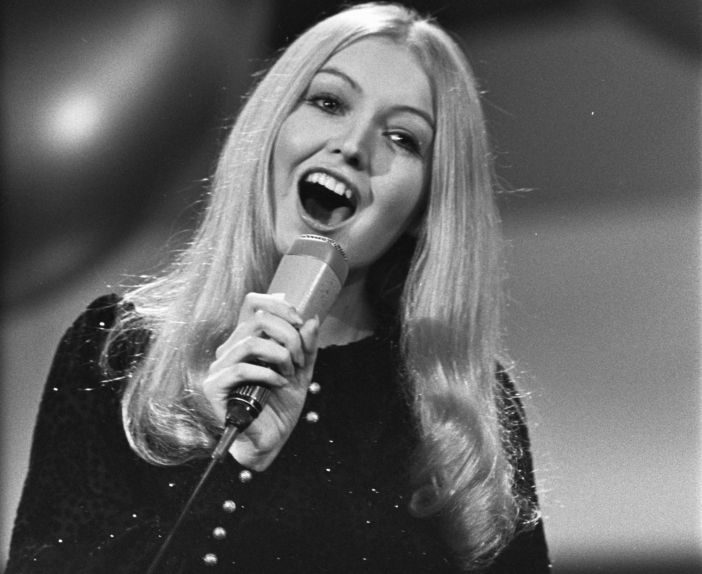 Mary Hopkin performing in black dress