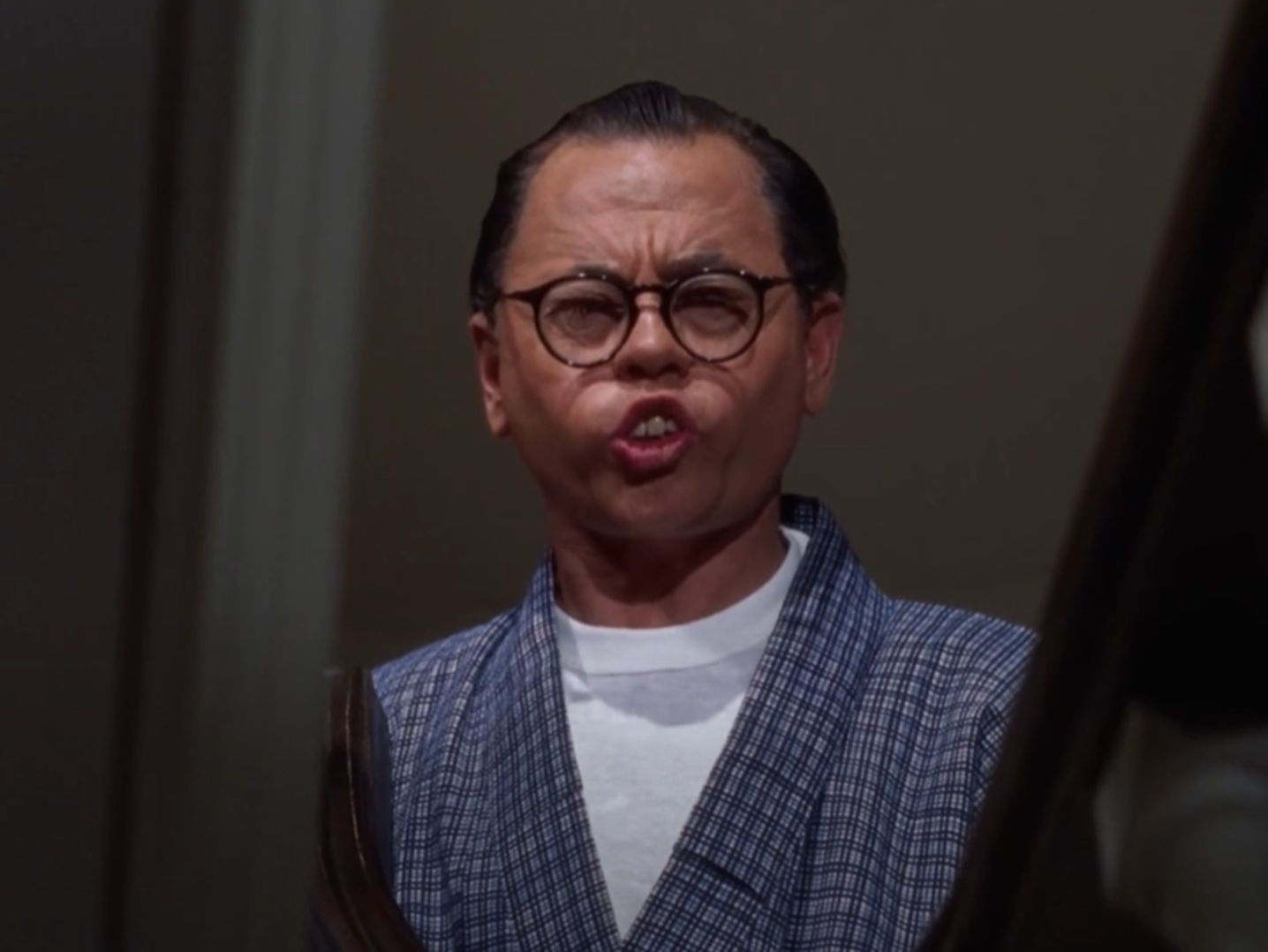 Screenshot of Mickey Rooney (Mr. Yunioshi) from - Breakfast at Tiffany’s (1961)