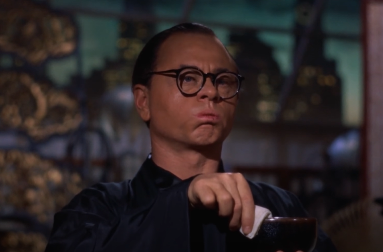 Screenshot of Mickey Rooney (Mr. Yunioshi) from - Breakfast at Tiffany’s (1961)