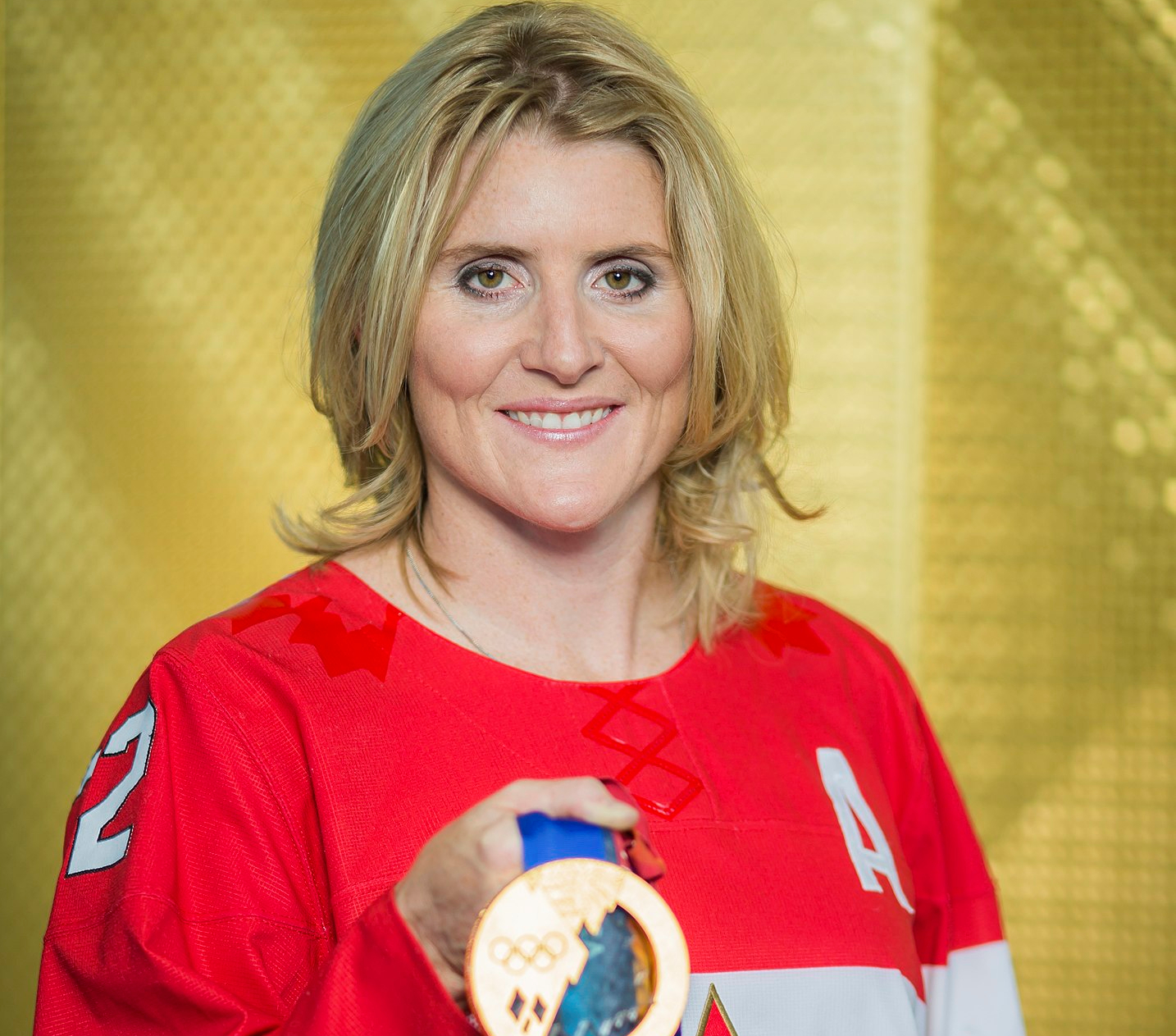 Hayley Wickenheiser  in red jersey