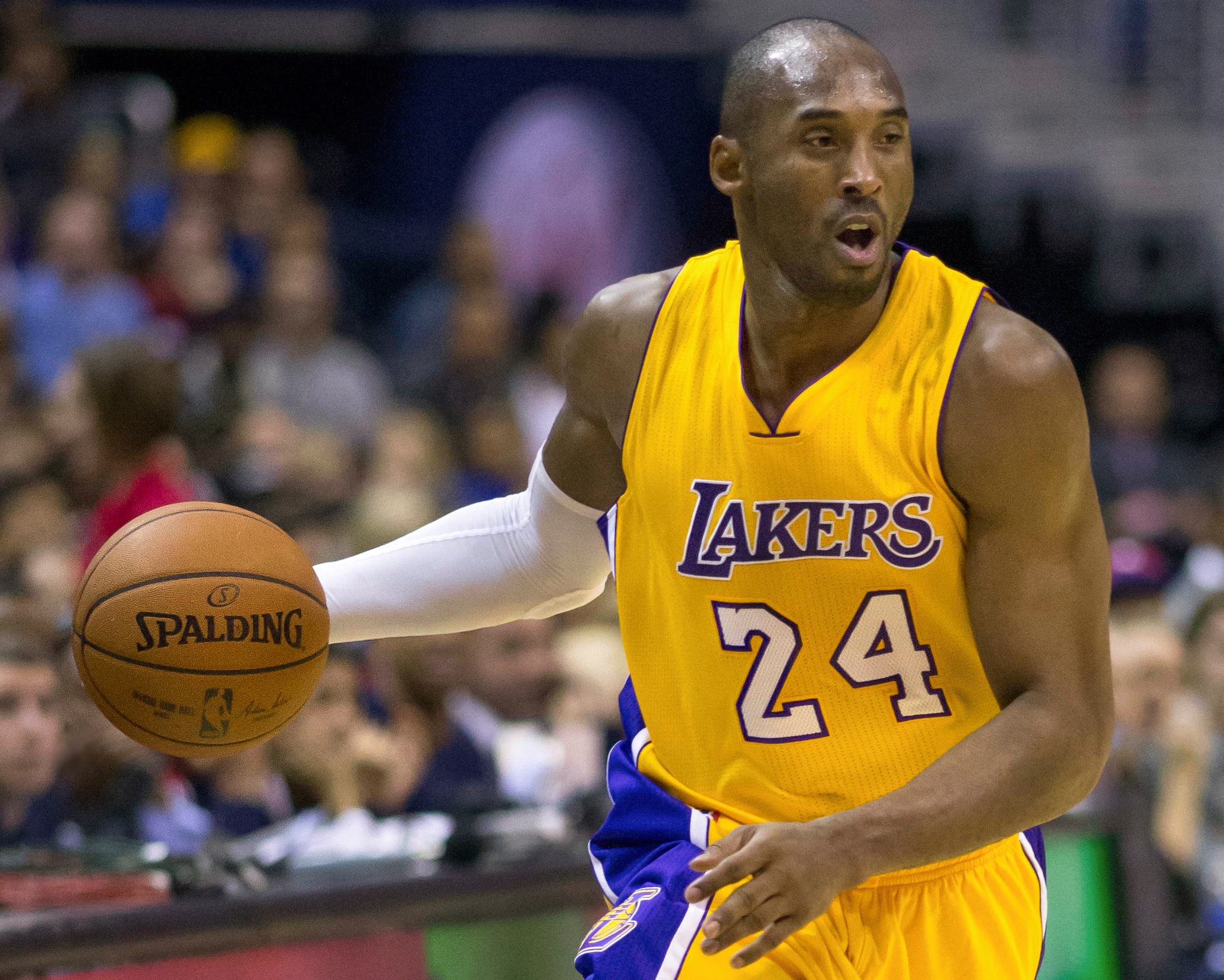 Kobe Bryant 2014 in yellow jersey