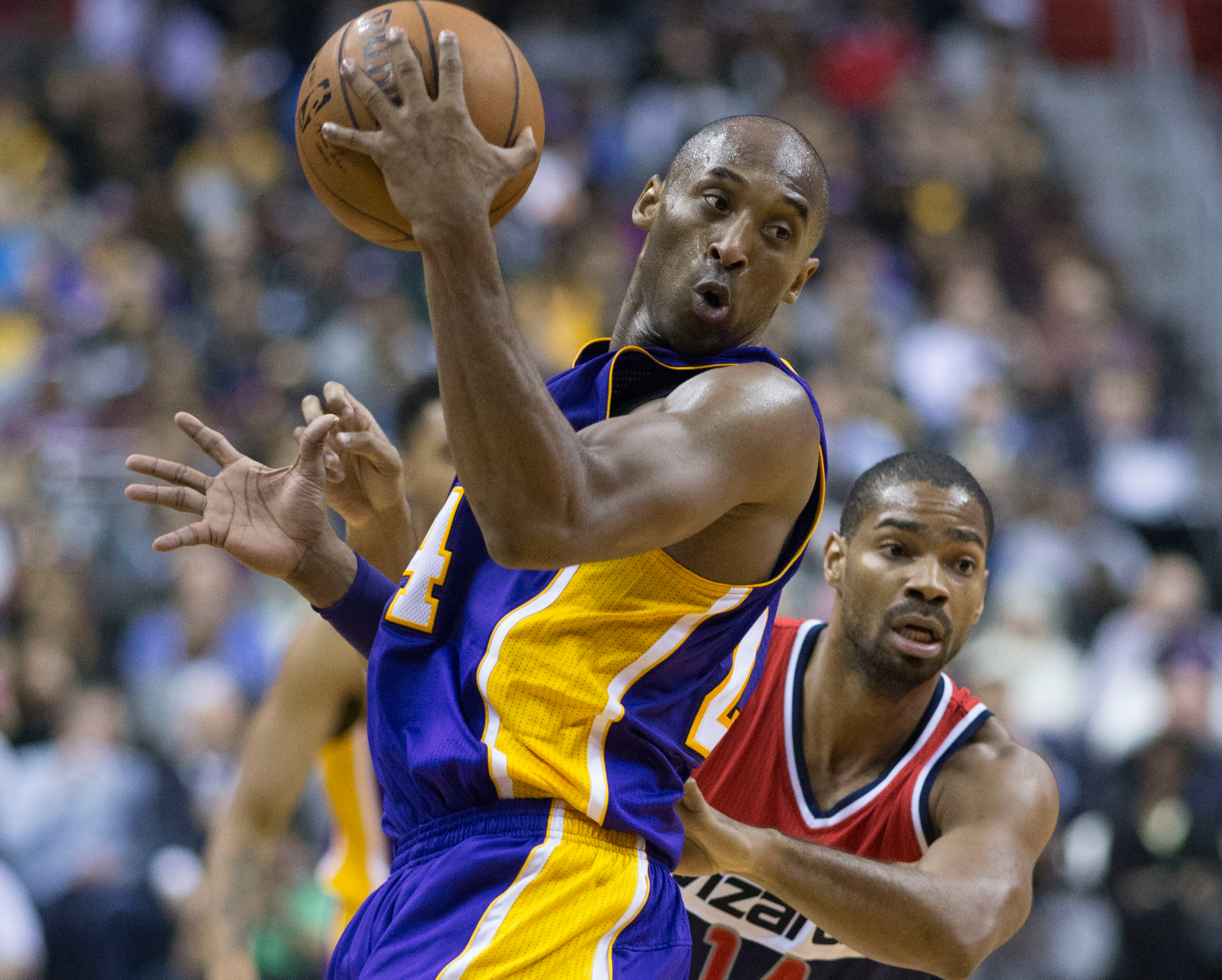 Kobe Bryant, guard with the Los Angeles  Vs Gary Neal  at a game