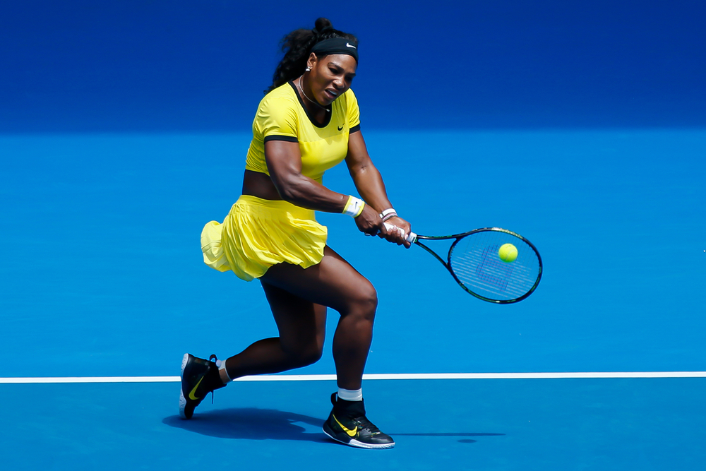 Serena Williams in yellow outfit