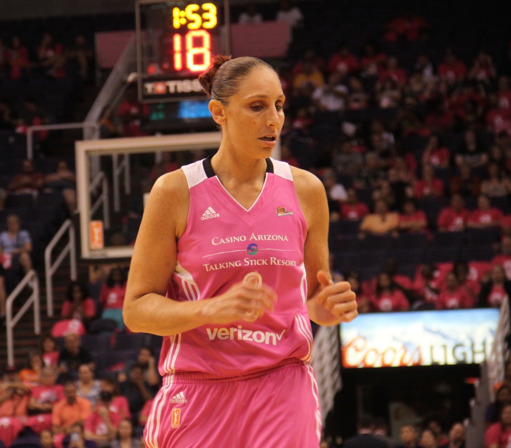 Diana Taurasi guard for Phoenix Mercury in pink jersey