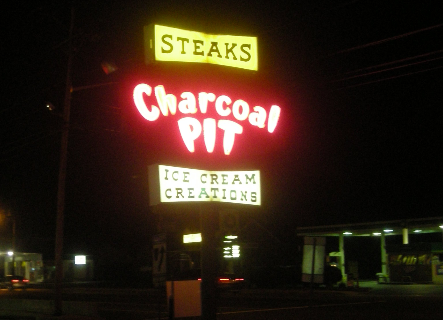 Charcoal Pit restaurant sign