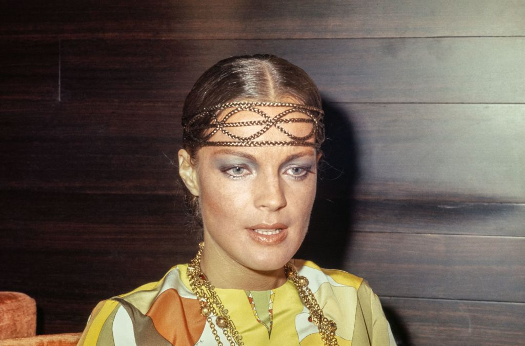 Romy Schneider in yellow top and jewels