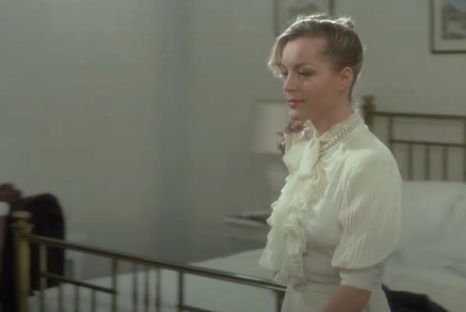 Screenshot of the movie The Old Gun (1975) showing Romy Schneider as Clara Dandieu