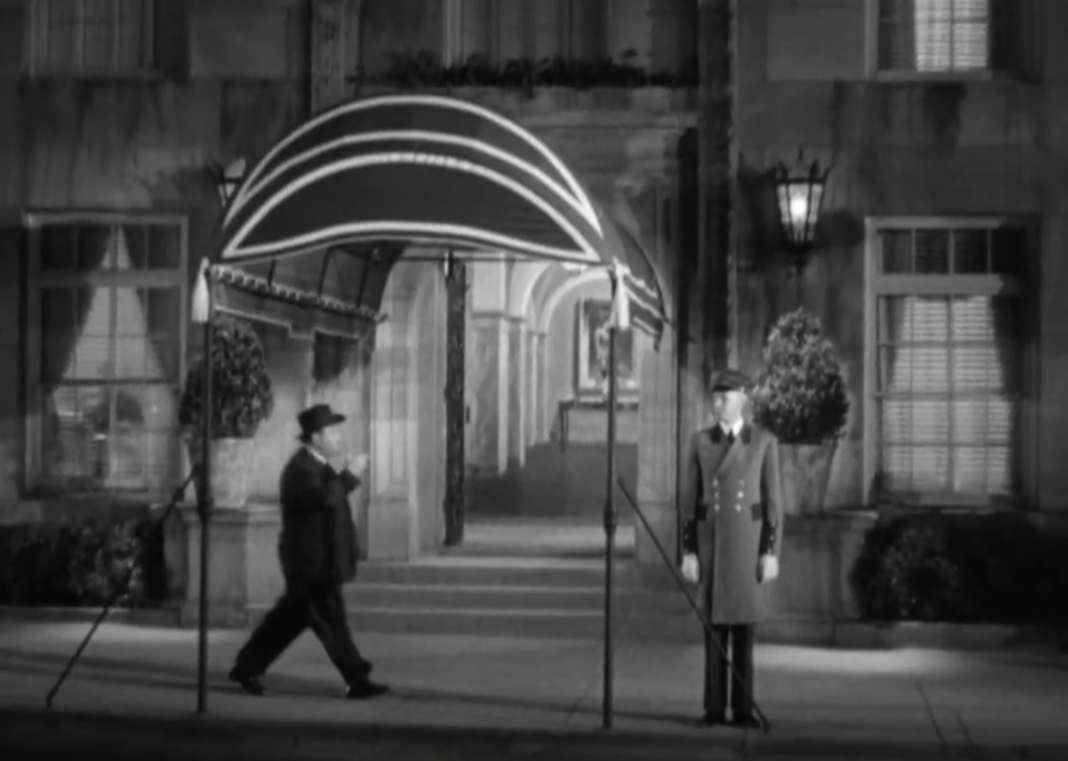 Screenshot of Alfred Hitchcock from - Mr. & Mrs. Smith (1941)