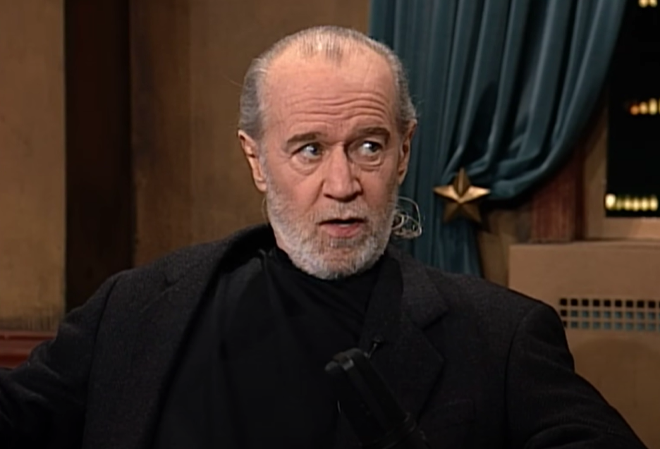 George Carlin in black outfit