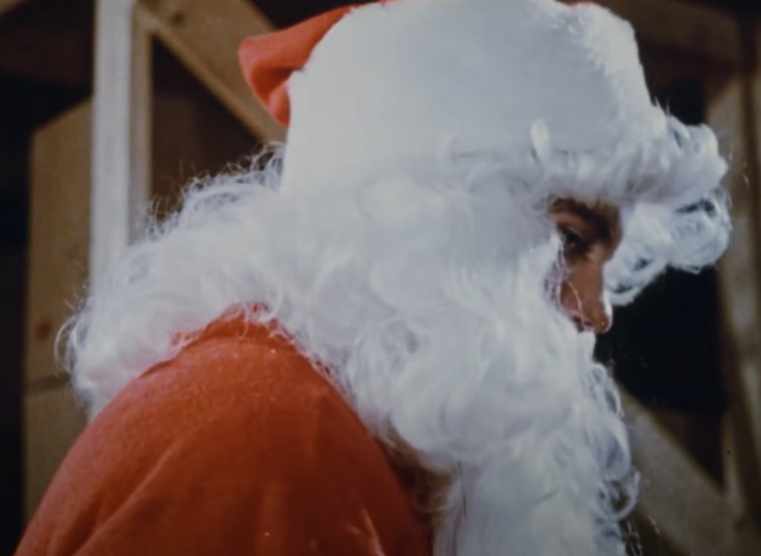 A visually captivating still taken from a pivotal moment in the film Silent Night, Deadly Night (1984)