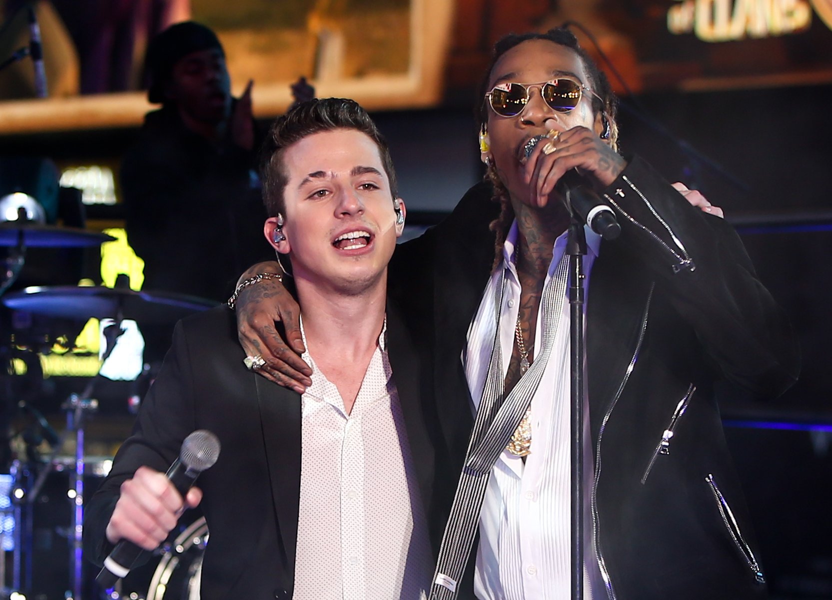 Recording artists Charlie Puth (L) and Wiz Khalifa perform in New York City