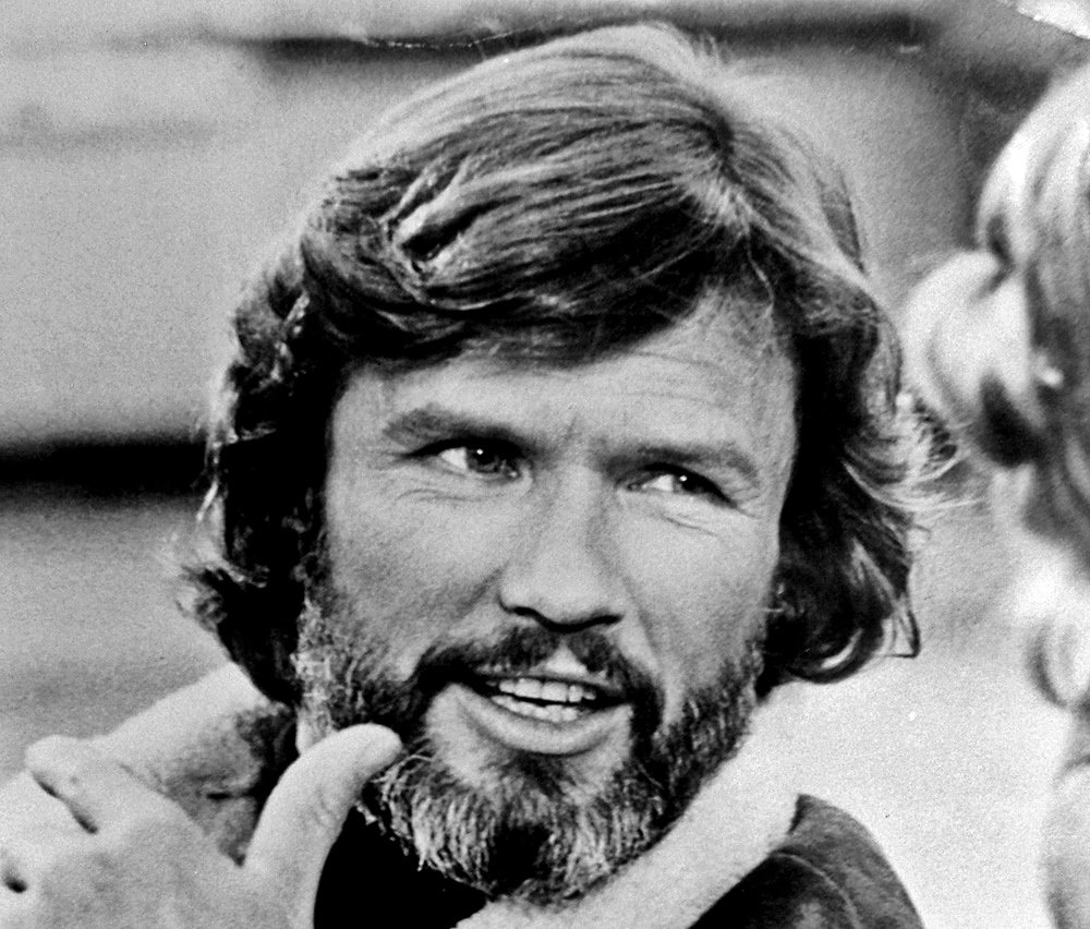 Photo of Kris Kristofferson in dark jacket