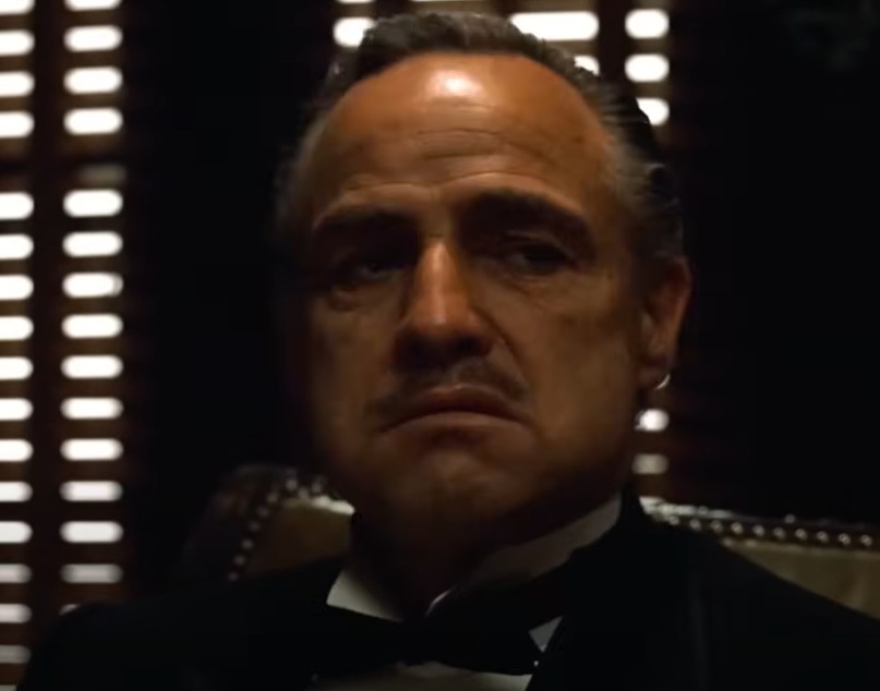 A visually captivating still taken from a pivotal moment in the film The Godfather (1972)