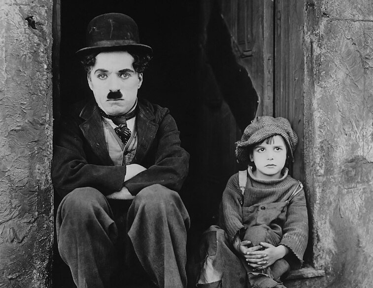 Grayscale Publicity photo from Charlie Chaplin's 1921 movie 