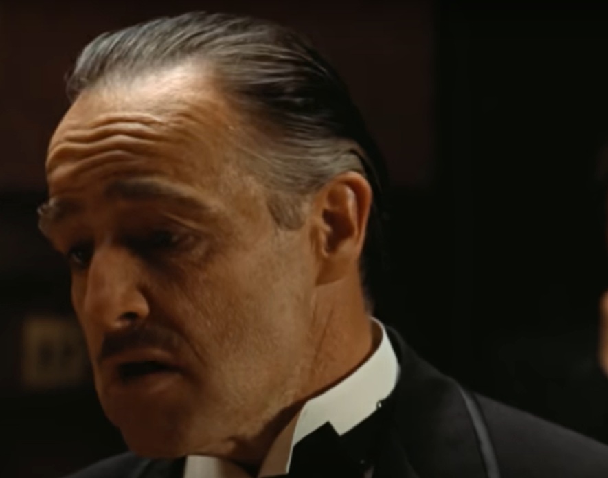 A visually captivating still taken from a pivotal moment in the film The Godfather (1972)
