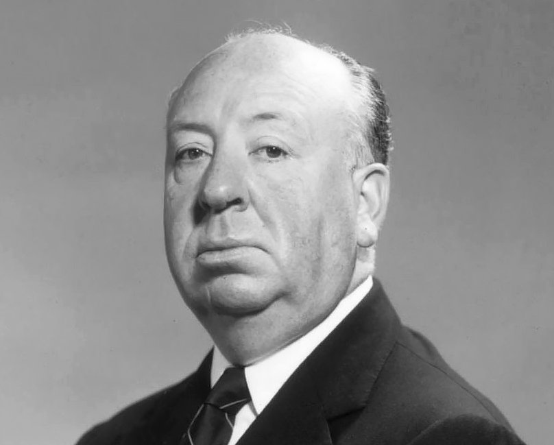 Grayscale Portrait Photo of Alfred Hitchcock in dark suit