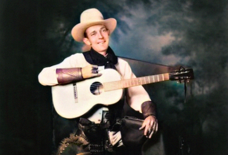 Jimmie Rodgers wearing cowboy attire