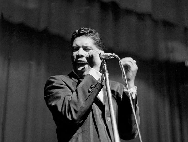 R&B singer Ben E. King performs at the Apollo Theatre in 1961