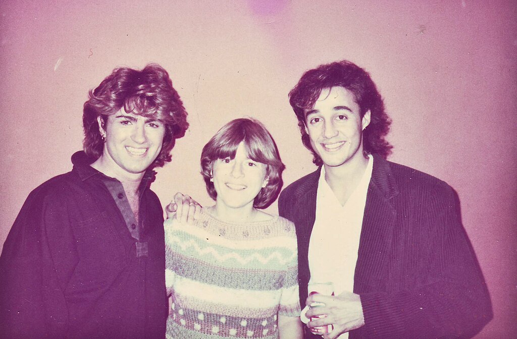 English pop duo Wham! with a TV host