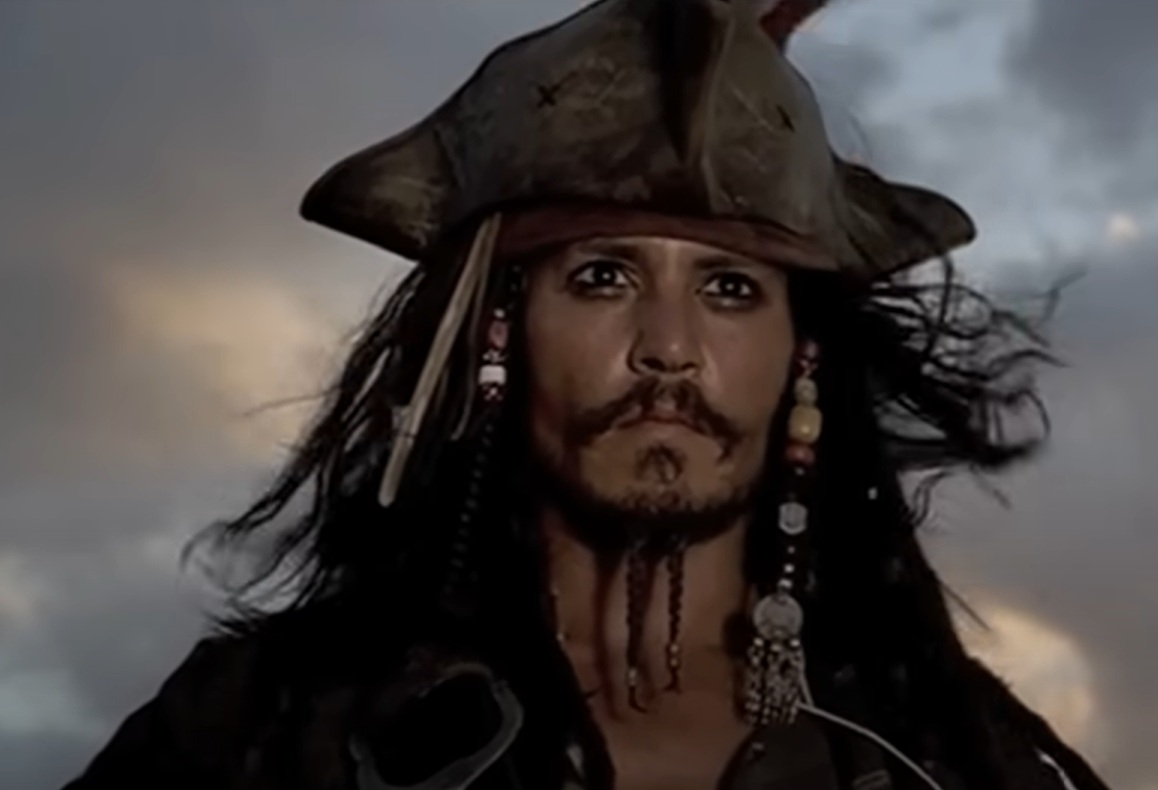 A visually captivating still taken from a pivotal moment in the film Pirates of the Caribbean: The Curse of the Black Pearl (2003)