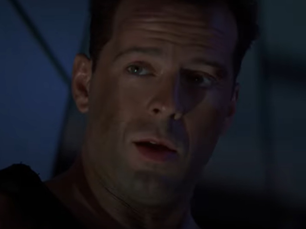 A visually captivating still taken from a pivotal moment in the film Die Hard (1988)
