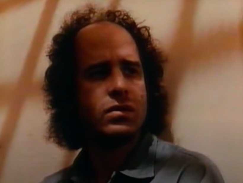 A visually captivating still taken from a pivotal moment in the film The Appointments of Dennis Jennings (1988)