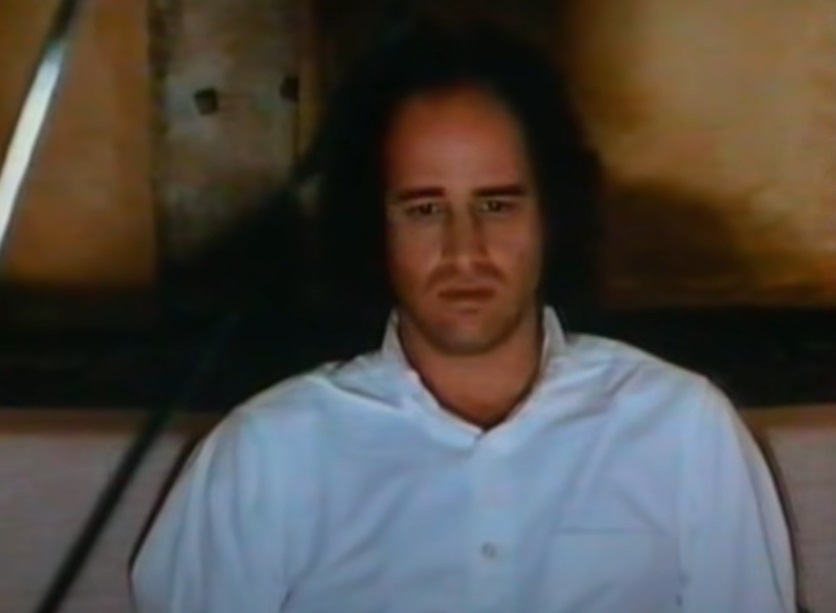 A visually captivating still taken from a pivotal moment in the film The Appointments of Dennis Jennings (1988)