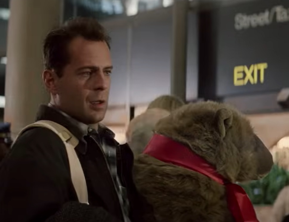 A visually captivating still taken from a pivotal moment in the film Die Hard (1988)