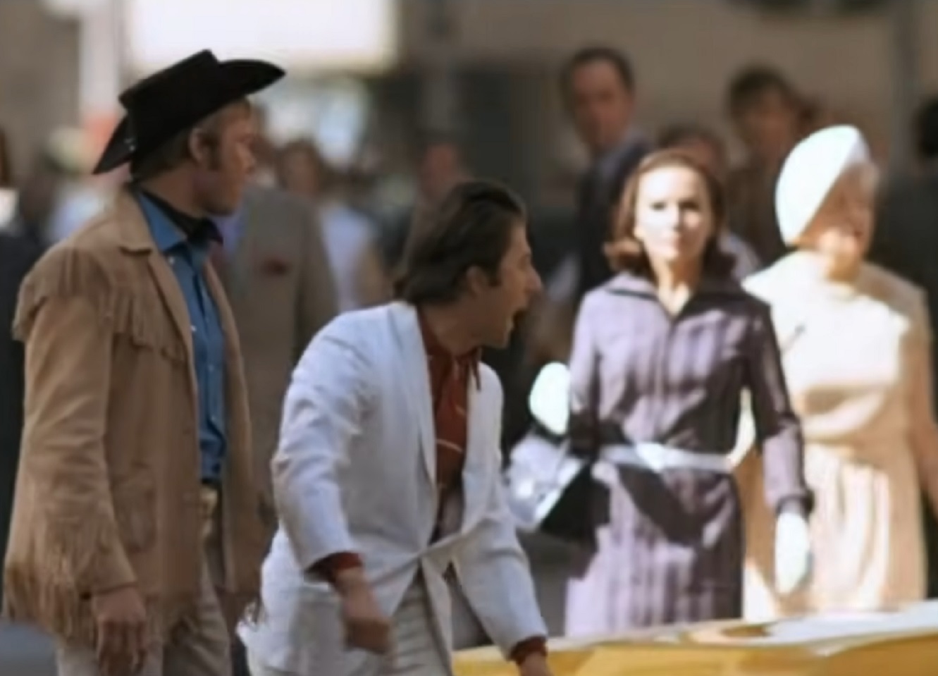 Screenshot of Dustin Hoffman yelling at Taxi - from Midnight Cowboy (1969)