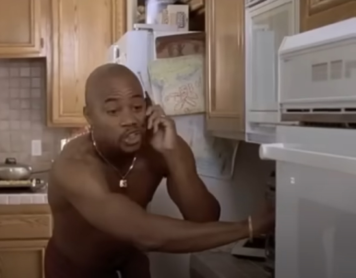 Screenshot of Cuba Gooding Jr. talking on the phone - from Jerry Maguire (1996)