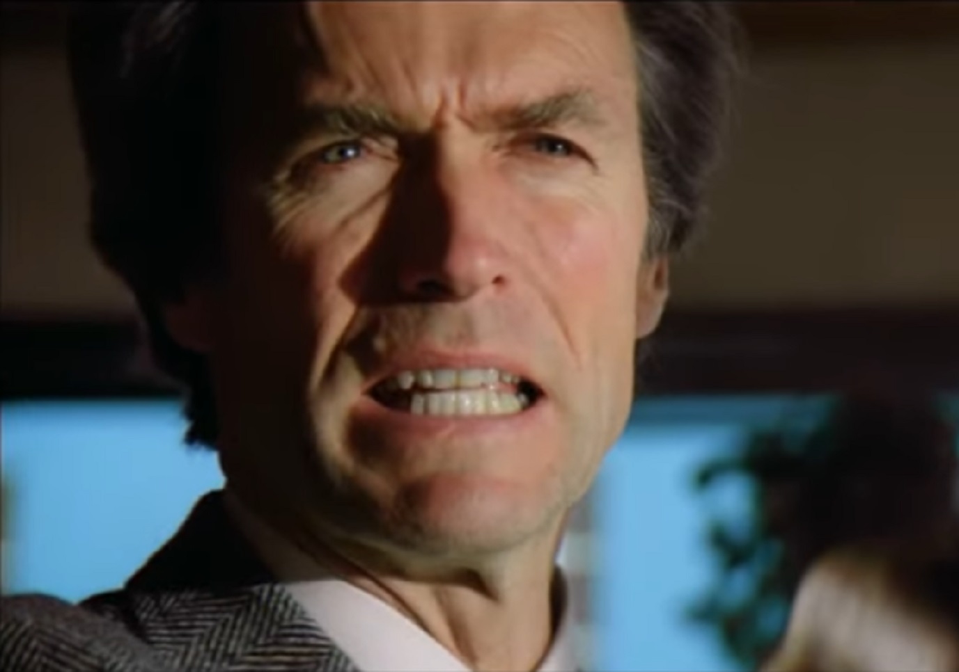Screenshot of Clint Eastwood looking at side - from Sudden Impact (1983)