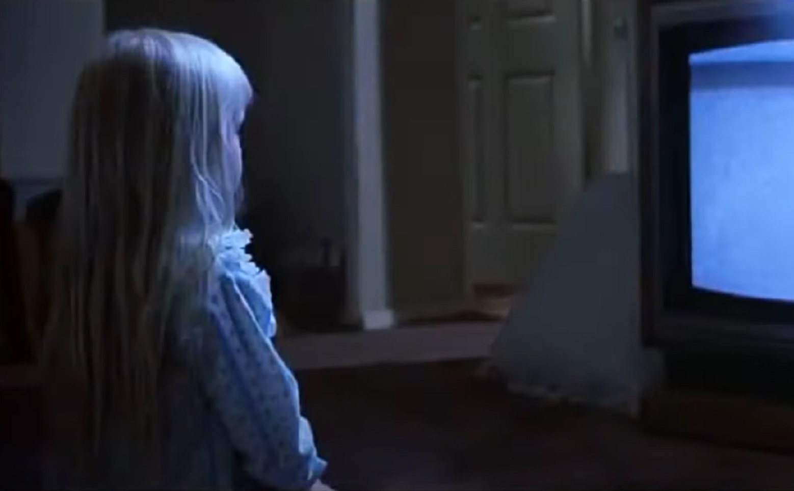 Screenshot of Heather O'Rourke watching TV - from Poltergeist (1982)