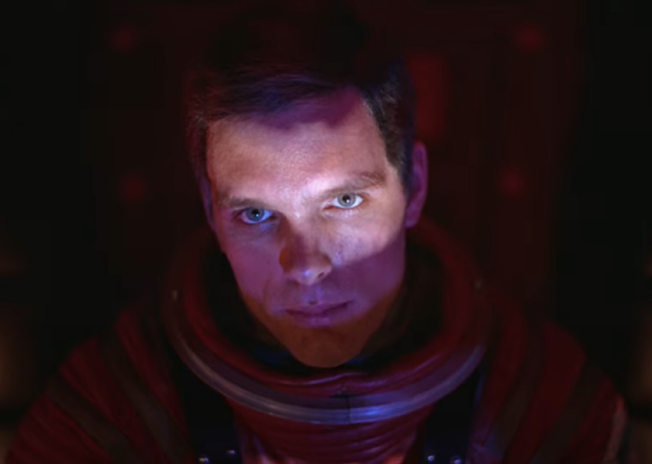 Screenshot of Keir Dullea looking at front - from 2001: A Space Odyssey (1968)