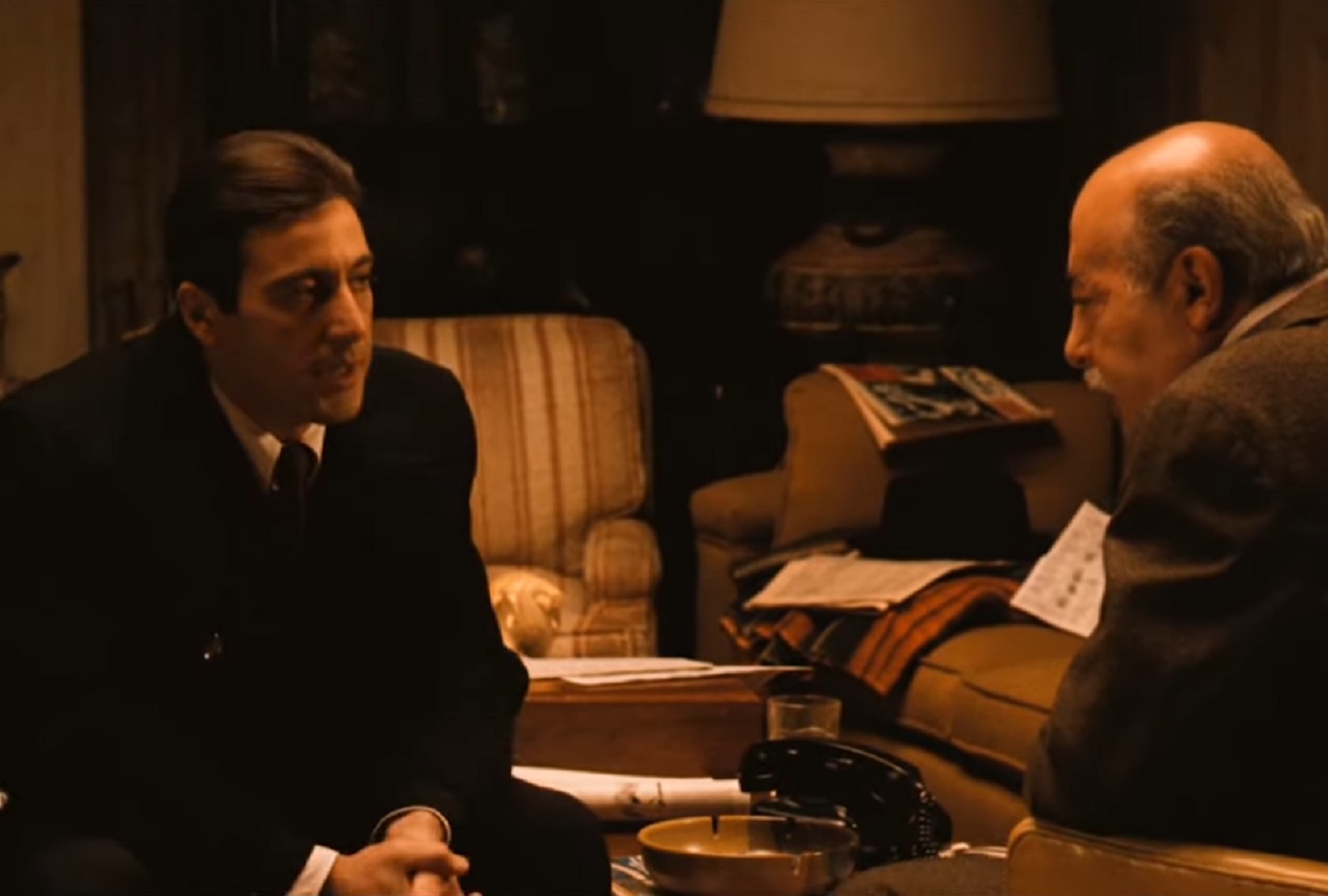 Screenshot of Al Pacino talking with other man - from The Godfather II (1974)