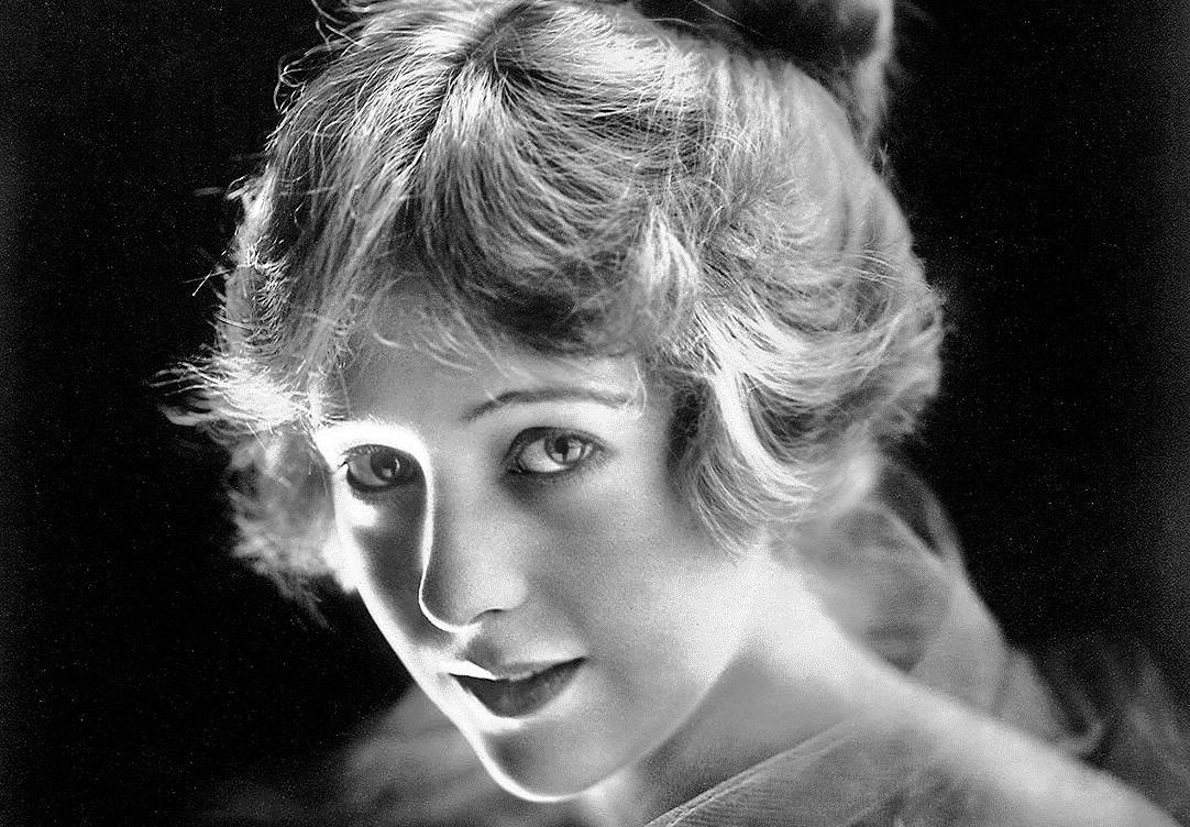 Jewel Carmen portrait in white dress