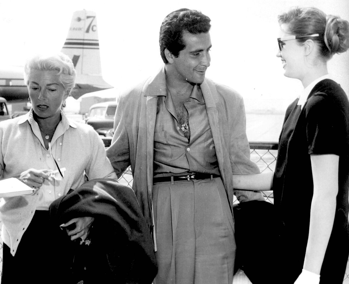 Grayscale Photo of Lana Turner, Johnny Stompanato, And Cheryl Crane