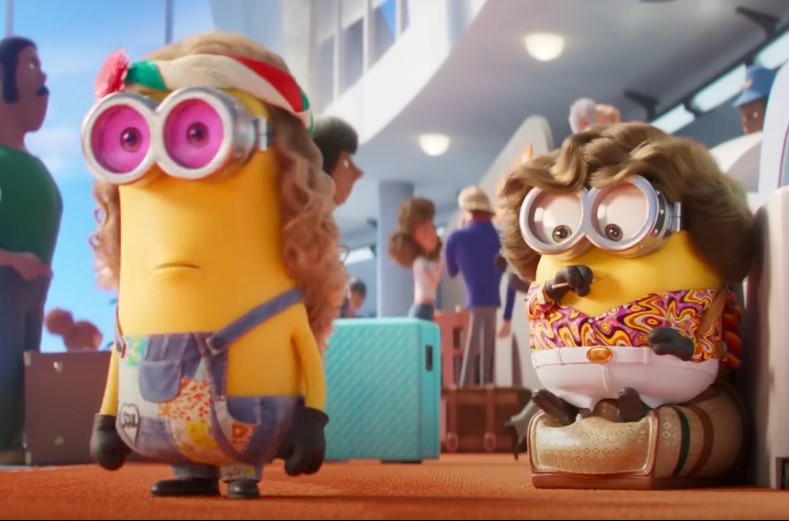 two minions at the airport