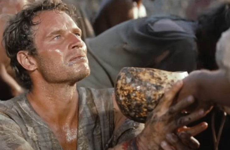 image of a thirsty man drinking water