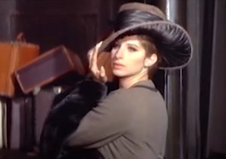 Image of a woman with big hat