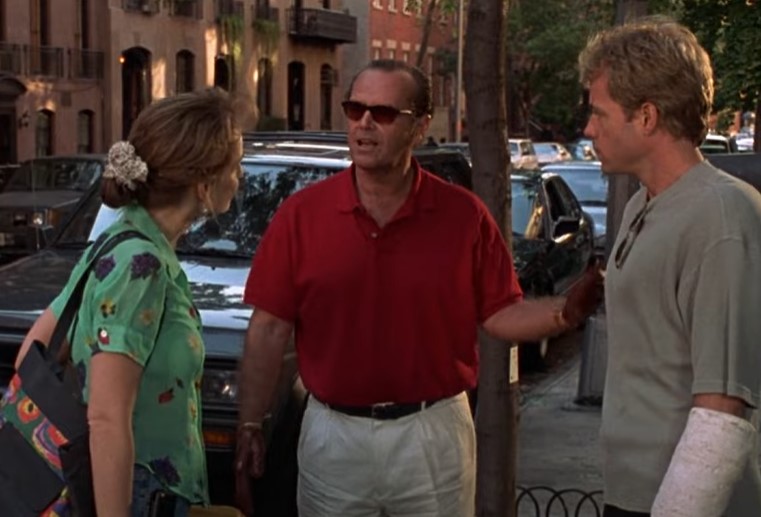 two men and a woman talking