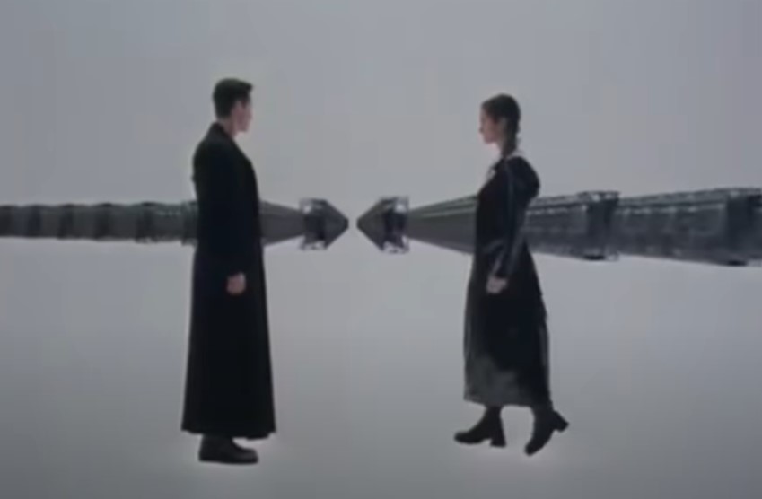 man and woman standing side to side