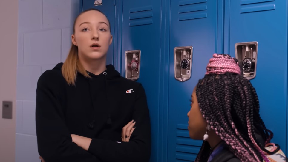 Tall Blond Girl and girl with dreads talking