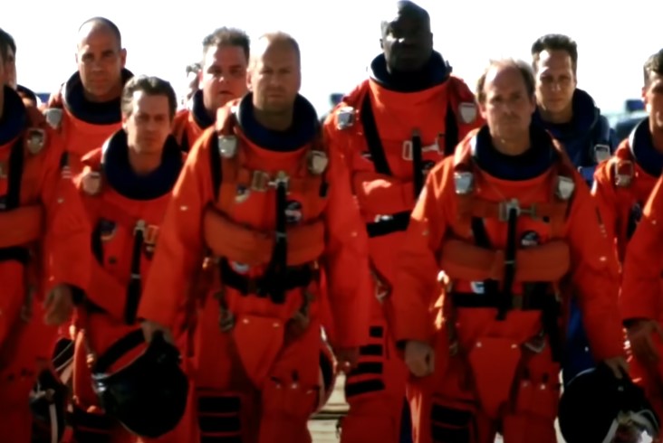 people wearing red cosmic costumes