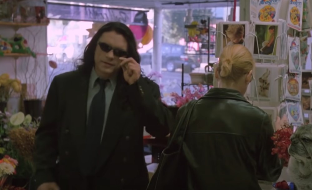 image of a man wearing a suit in a store