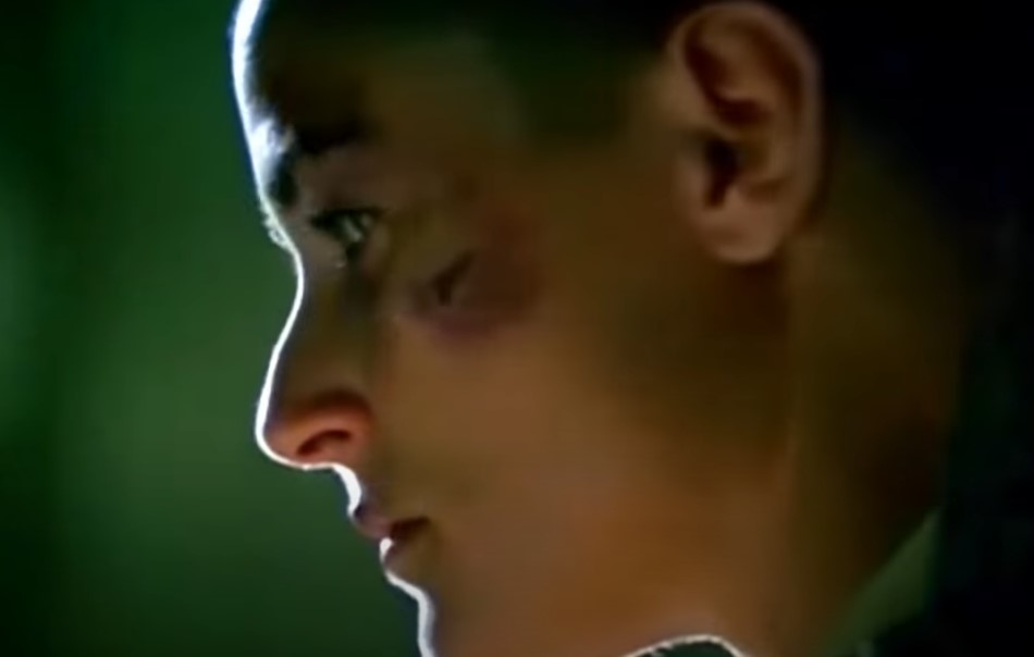 image of a girl with short hair looking aside